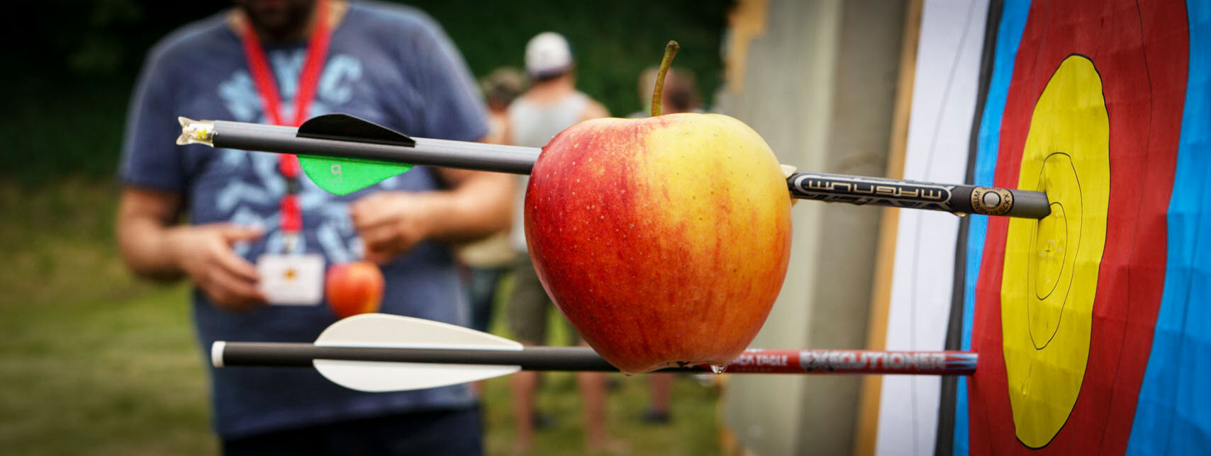 Teaser image featuring an arrow piercing an apple.